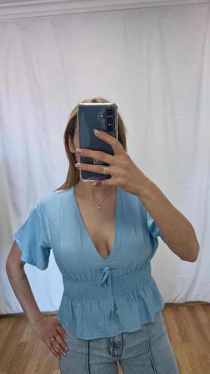 Blusa volante azul