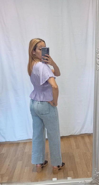 Blusa volante lila